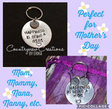 “Happiness is being a” keychain.